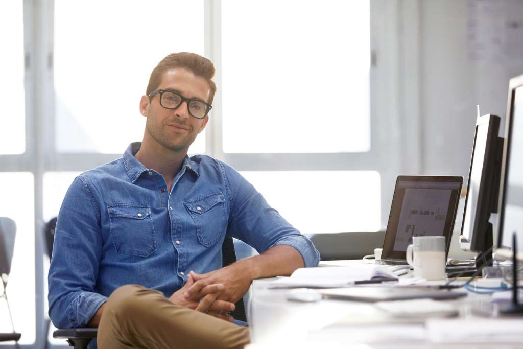 man sitting at a desk